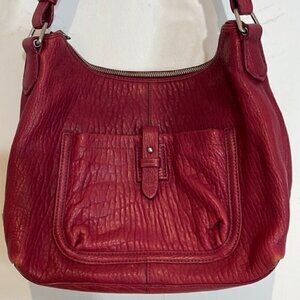 Cole Haan Buttery Soft Leather HeavyGrain Shoulder Bag in a magenta raspberry